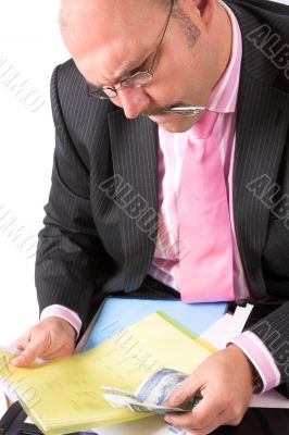 Businessman checking his spreadsheet