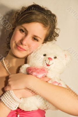 Beautiful girl with teddy bear