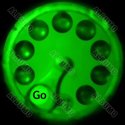 Black go sign as indicated by machine