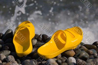 slippers on the beach