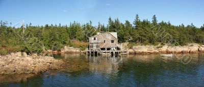 Old house & wharf on bay