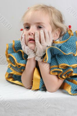retro thinking toddler girl with gloves