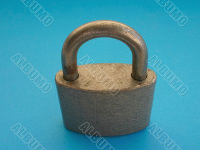 close-up of padlock on blue