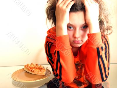 The sad girl with a pizza.