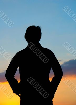 silhouette against summer sunset