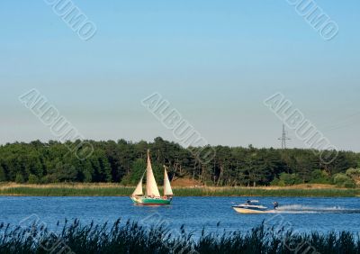 sailboats on a lake