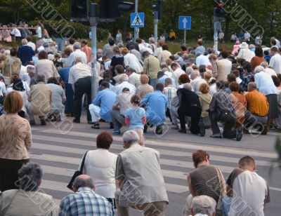 kneeling crowd