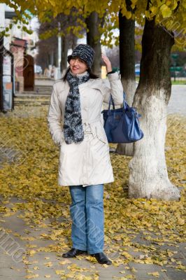 woman in autumn street