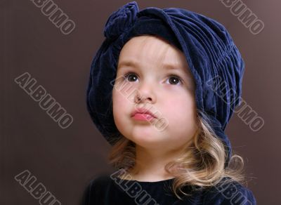  little girl in blue hat