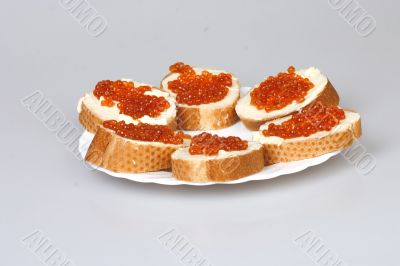 bread with butter and red caviar