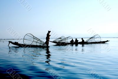 fishermen on water