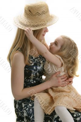 mother daughter and hat