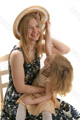 mother daughter and hat