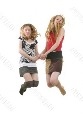 young girls jumping
