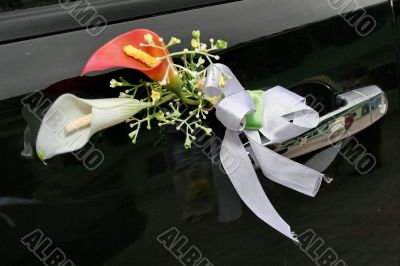 Wedding car decorations with flower bouquet