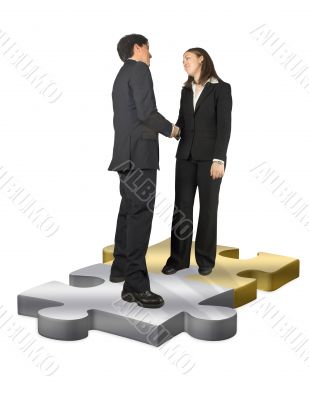 business couple shaking hands on puzzle pieces