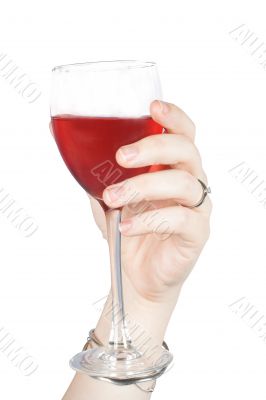 Hand with red wine glass