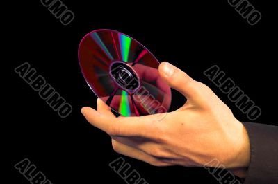 hand holding CD