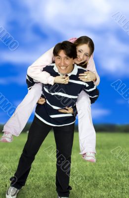 girl playing with big brother