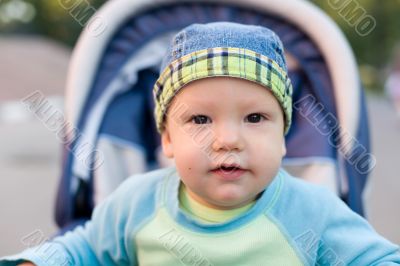 Baby in sitting stroller #12=3