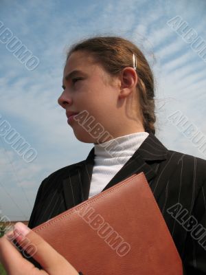 Young businessgirl with a book