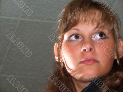 Portrait of the girl looking sideways