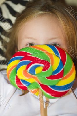 young child with lolly