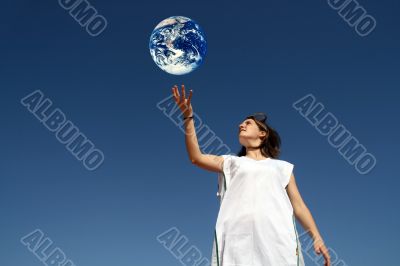 girl holding earth