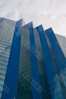 Modern Skyscraper under a cloudy sky