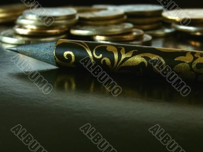 pencil and coins
