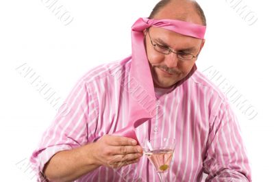 Wiping his glass