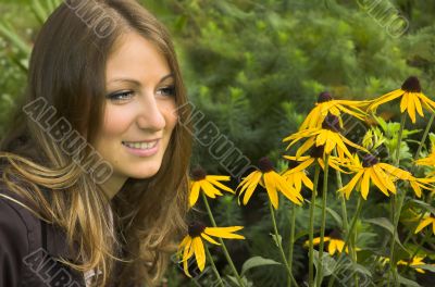 The girl close up among yellow colors