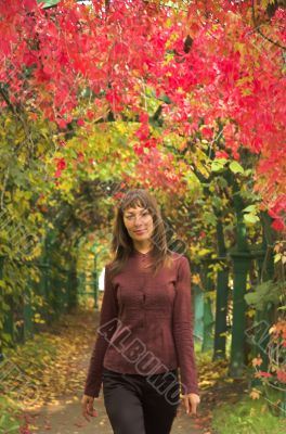The beautiful girl in autumn park