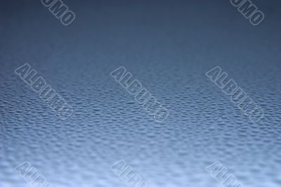 drops on blue metal