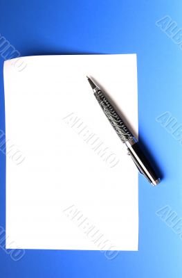 pen and sheet of white paper