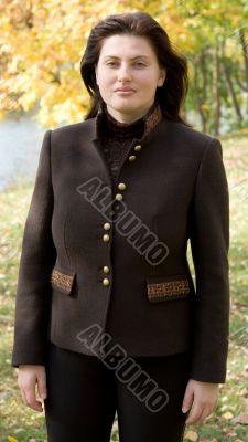 woman against autumn park