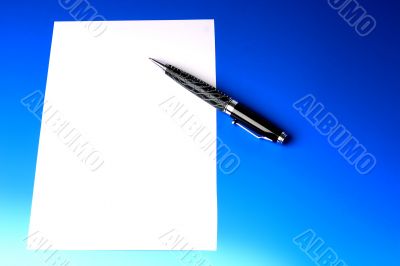 pen and sheet of white paper
