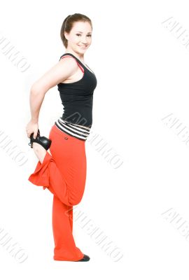 A young girl stretching