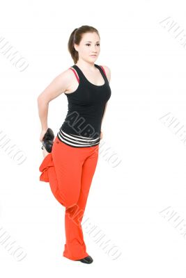 A young girl stretching