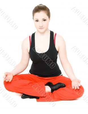 A young girl stretching