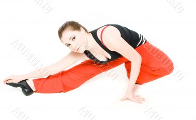A young girl stretching
