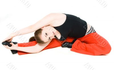 A young girl stretching