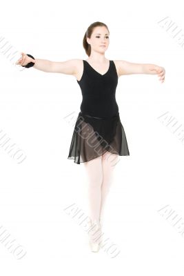A young girl stretching