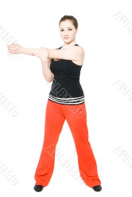 A young girl stretching