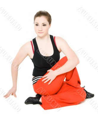 A young girl stretching