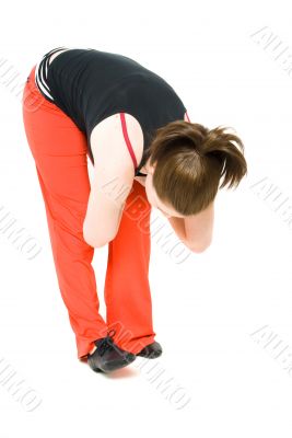 A young girl stretching