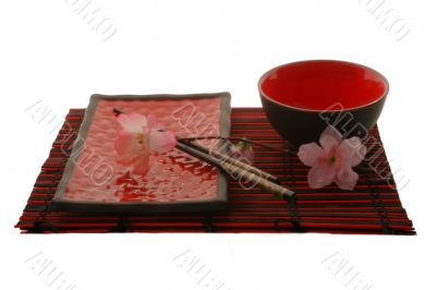 Chinese sticks, plate and cup