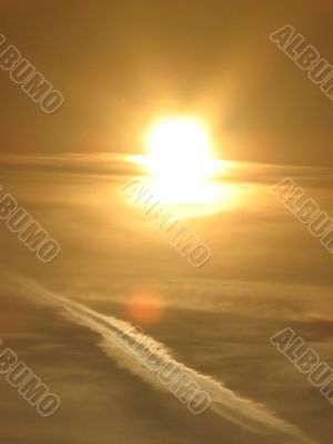 sun, sky and airpalne stripe
