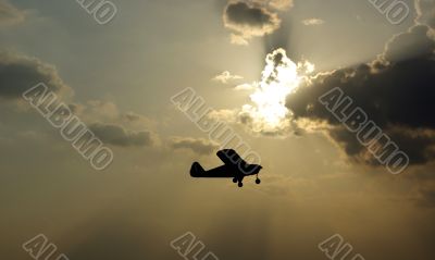 Small airplane  in the sky.