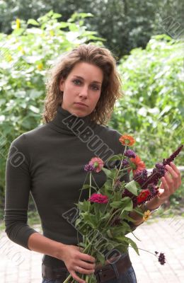 Pretty girl with fresh flowers